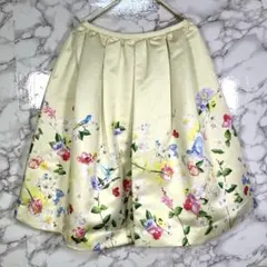 Chesty　（1）　フラワーバード柄　フレアミニスカート　イエロー系