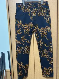 PEARLY GATES パーリーゲイツ　パンツ　総柄　ネイビー サイズ4 美品】パーリーゲイツ パンツ ネイビー×マルチカラー 英字総柄 メンズ