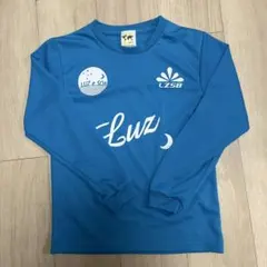 Luz e Sombra 長袖シャツ 青　140