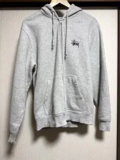 Stüssy グレー ジップアップパーカー Stüssy グレー ジップアップパーカー 【公式通販】