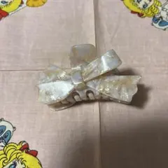 スナイデルホーム薄いピンクリボン型ヘアクリップ