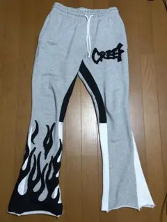 CREEF フレア炎プリントスウェットパンツ XS