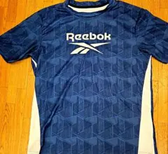 美品 Reebok リーボック 半袖 Tシャツ 総柄 スポーツウェア Lサイズのサムネイル