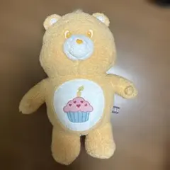 ケアベアのオレンジ色ぬいぐるみ