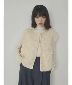 クリーム色 ニットベスト alumu.