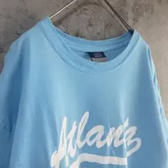 MV SPORT USA古着 プリント デザインTシャツ 半袖 水色 Lサイズ