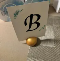 結婚式　披露宴　テーブル席装飾 ゴールド留め具