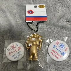 ミャクミャクゴールドキーホルダーと東西ゲート推し缶バッジセット