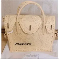 カービングトライブス　グレースコンチネンタルバッグ