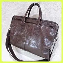 コーチ COACH ブラウン本革型押しオプアート ビジネスバッグ斜めがけA4可✧