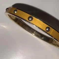 今だけセール coach スタッズ バングル ゴールドのサムネイル