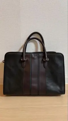 COACH ビジネスバッグ レザー 革 ロゴ型押し ストライプ 切替 黒 茶