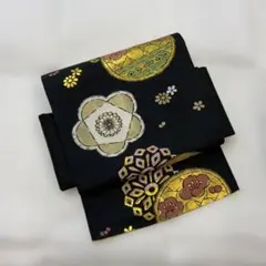 【アンティーク】可愛い❣️名古屋帯 黒地 金彩 梅 菊 華文様　300のサムネイル