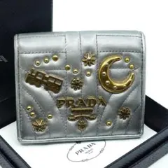 PRADA プラダ 二つ折り財布 シルバー メタリック スタッズ レザー 1のサムネイル
