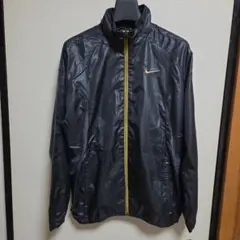 NIKEナイキ　ナイロンジャケット　裏地メッシュ　刺繍ロゴ　黒金　メンズL