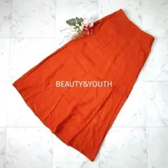 ビューティーアンドユース フレアスカート オレンジ リネン混 三崩し模様