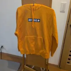 Nike JUST DO IT. フード付きパーカー オレンジ