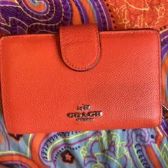 COACH オレンジ 二つ折り財布