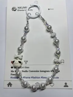 犬のチャーム付きパールストラップ