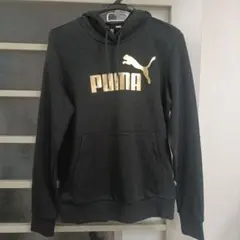 PUMAスウェットパーカー ESS+ METALLIC LOGOHOODIETR