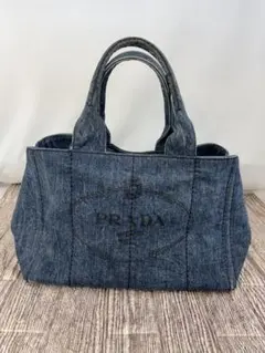 プラダ　カナパ　デニム　美品　サイズTU プラダ「カナパ」の定価は？サイズ比較やおすすめコーデ・値上げ