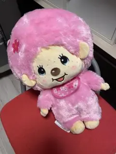 ピンクのモンチッチのぬいぐるみ