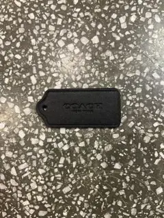 COACH ブラックレザータグ型キーホルダー