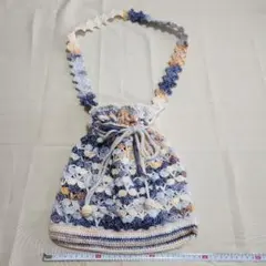 手編みの巾着型ポシェット