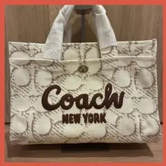 COACHコーチシグネチャーカーゴトートバッグ大容量34cm - メルカリ