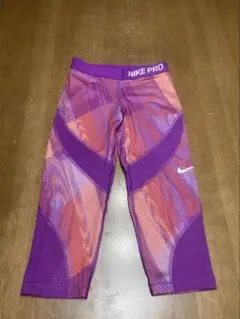Nike Pro ボトムス 紫・オレンジ 幾何学模様 (スパッツ) レディースL