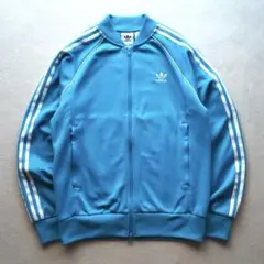 adidas トラックジャケット ジャージ 刺繍ロゴ ライトブルー ユニセックス