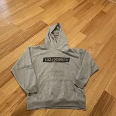 Luz e Sombra グレー フーディー サイズ150