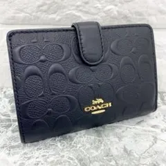 極美品 COACH 折り財布 シグネチャー エンボス レザー F67565 - メルカリ