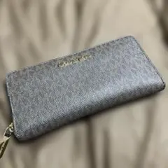 正規品MICHAEL KORS 長財布 ラウンドファスナー ブラウンのサムネイル