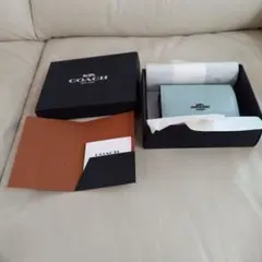 COACH 三つ折り財布 ライトブルーのサムネイル