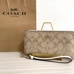 早い者勝ち！訳あり新品 COACH 長財布 シグネチャー柄 ベージュ