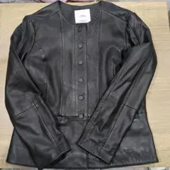 即日・まとめ買いにも対応 ブラックレザージャケット ボタン付き