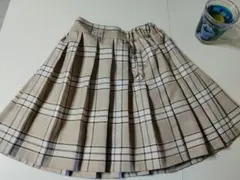 美品未使用キッズ女の子　可愛いベージュ系チェック プリーツスカート 150cm