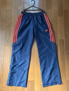 アディダス　ナイロンパンツ ネイビー×オレンジ