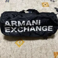 ARMANI EXCHANGE ブラックドラムバッグ
