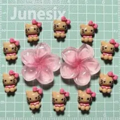 ネイルパーツ 日焼けキティちゃん ピンク プルメリア 大きめ キャラクターのサムネイル