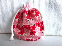 赤い花柄 まんまる巾着袋