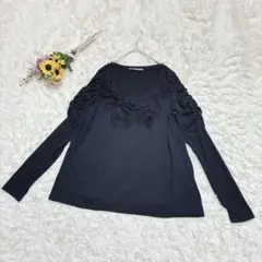 Mignon　フリル付き　長袖カットソー　リボンモチーフ　パフスリーブ　黒　Ｍ
