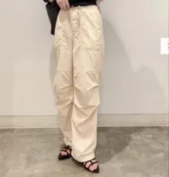 GU テックパラシュートプルオンパンツ(丈標準) ライトオレンジ Lサイズ