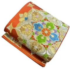 ユ103袋帯 金銀糸　唐織　宝相華 七宝 金糸 オレンジ成人式 結婚式　美品