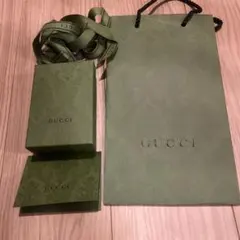 GUCCI 箱とショッパー緑色