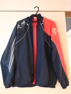 adidas ウィンドブレーカー ネイビー/オレンジ