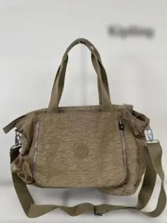 Kipling キプリング／ベージュ ナイロンバッグ チャーム付き 軽量