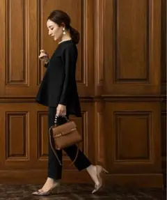 ブラック パール付ヘムライントップス　M ユアーズ