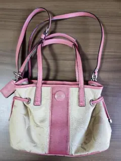 使用感、汚れあり ピンクとベージュのCOACHのショルダーバッグ